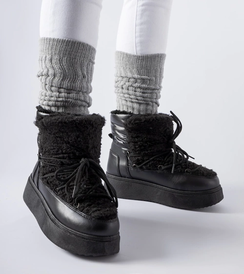 Juodi sniego batai ant masyvios platformos Elvio