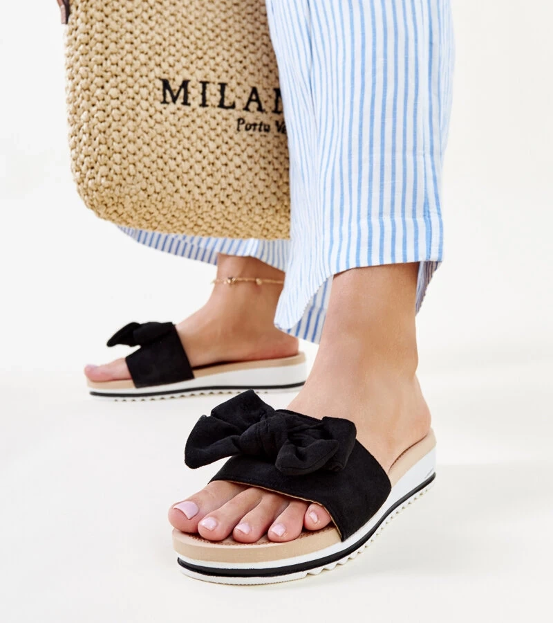 Juodi žemių pado basutės Mikhaila