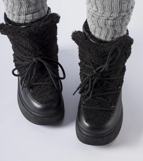 Juodi sniego batai ant masyvios platformos Elvio